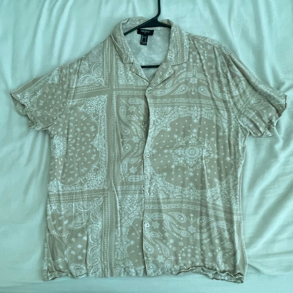 beige button up shirt
